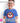 Boy wearing blue Mickey Mouse Club shirt