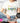 White t-shirt with colorful Disney World illustration